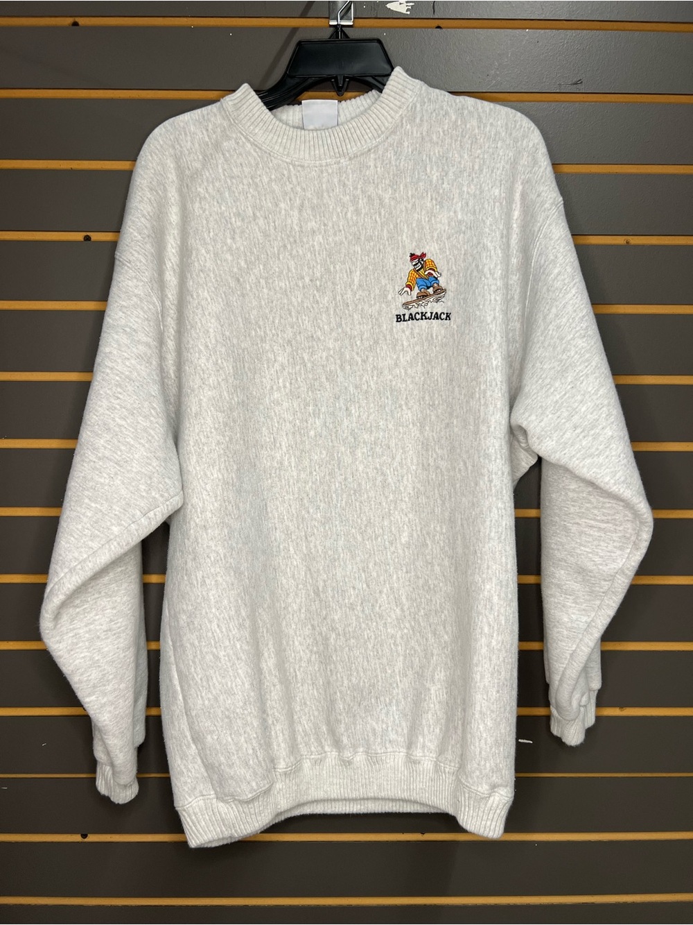 AU sportswear grey crewneck sweatshirt featured embroidered “blackjack” logo